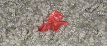 red stain on carpet